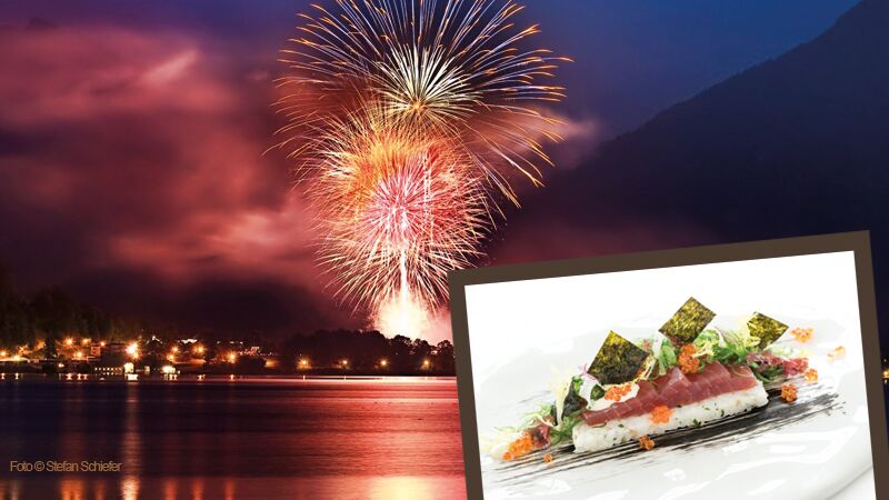 Ankündigung der Silvestergala 2018 im Stieler-Haus mit einem Bild eines Feuerwerks über dem nächtlichen  Tegernsee sowie Köstlichkeiten des Stieler-Haus